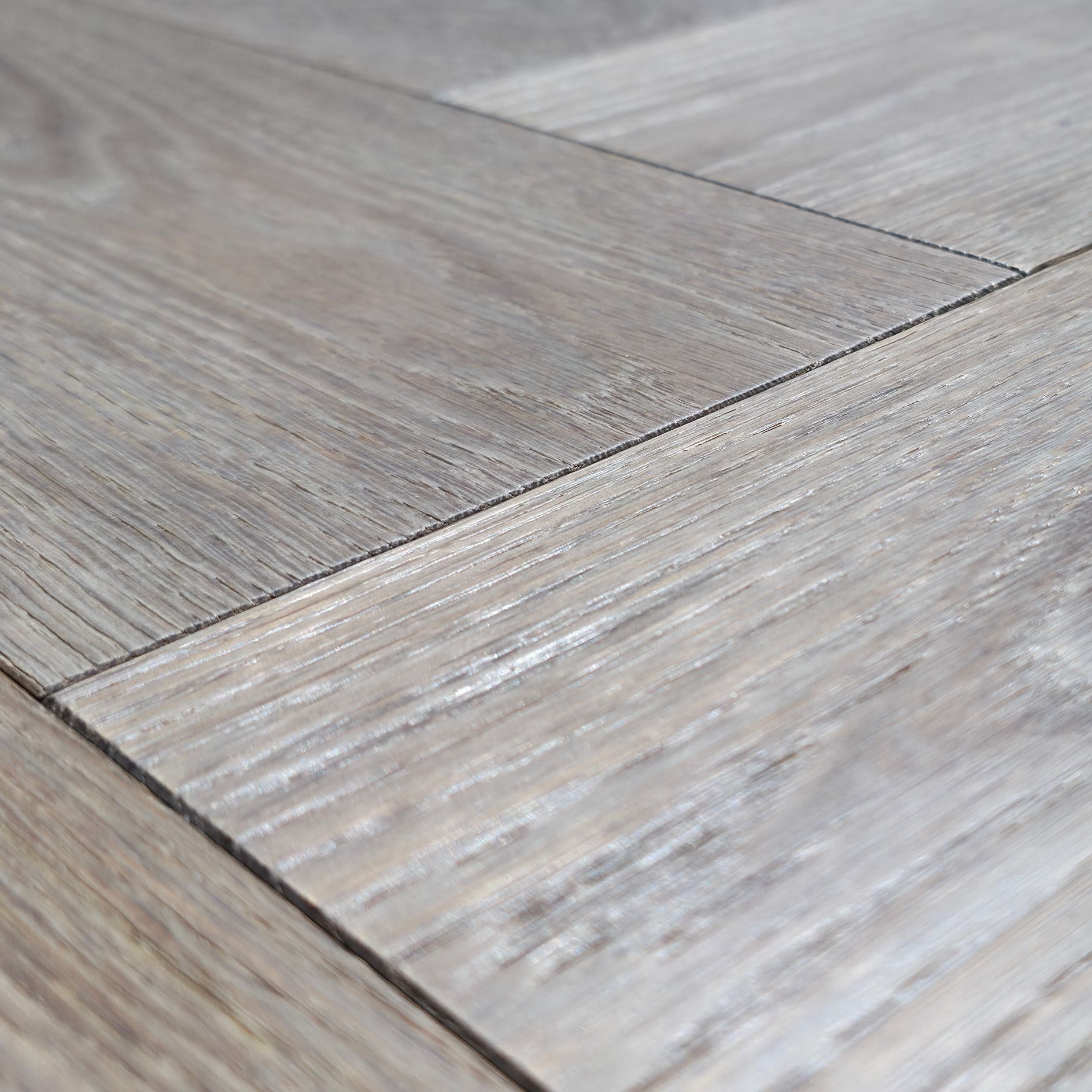 Engineered European Oak Ember Valley - Herringbone super closeup to show wood detail.