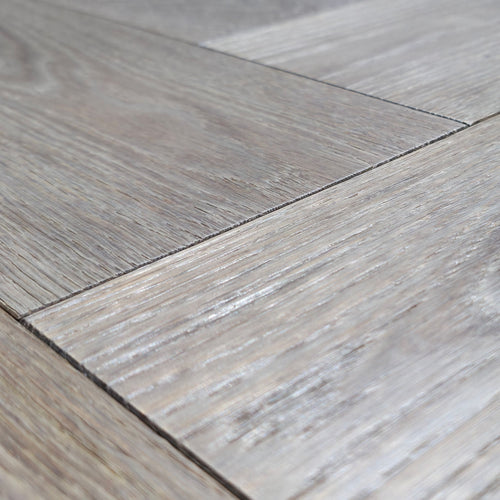 Engineered European Oak Ember Valley - Herringbone super closeup to show wood detail.