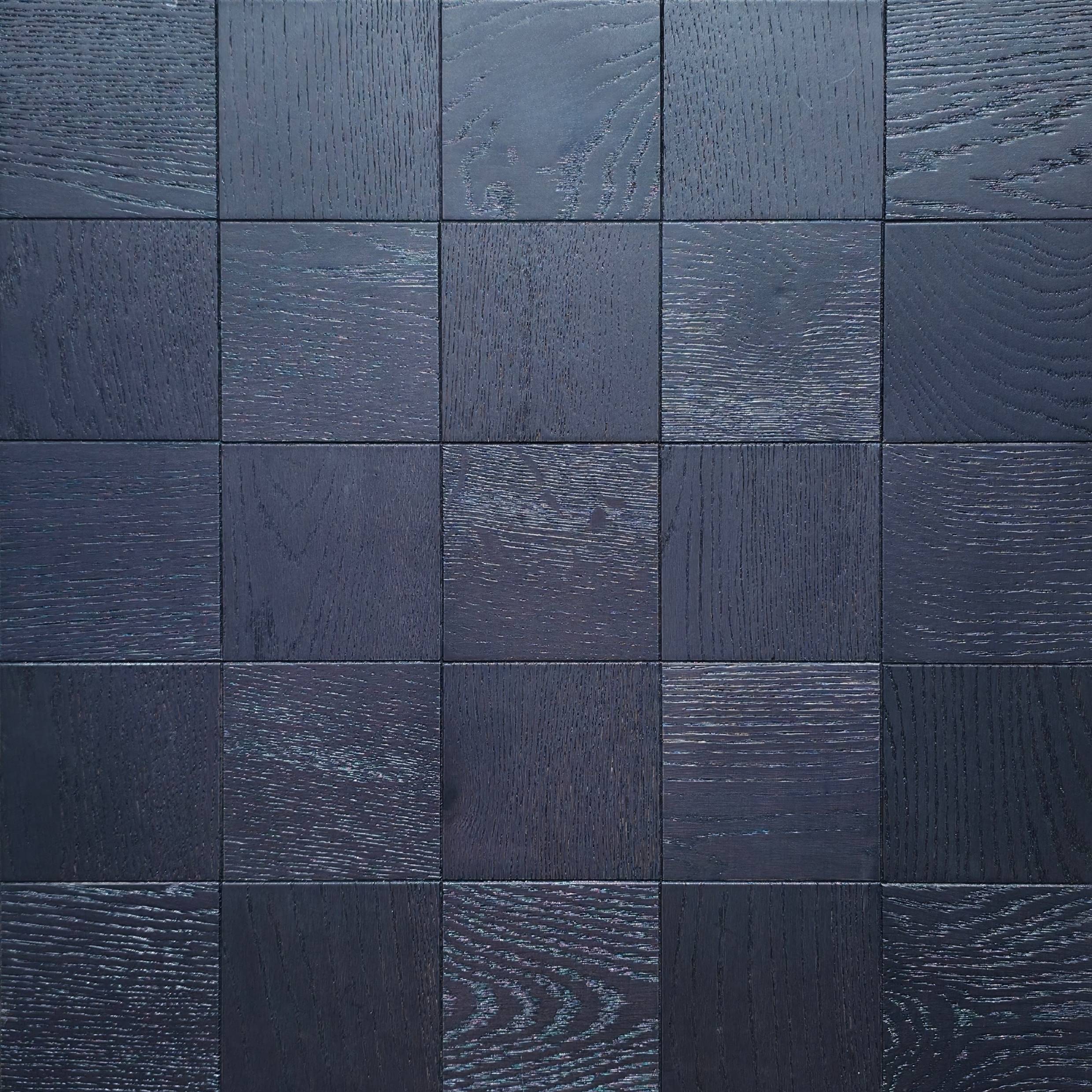 Dark charcoal gray square tile mosaic wall or floor with a subtle woodgrain. Engineered European Oak Ombre Royale - Parquet 