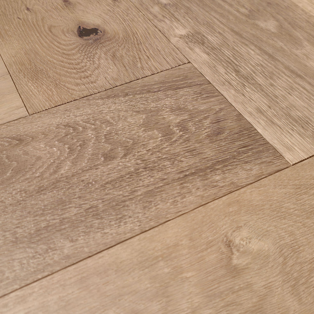 Engineered European Oak Gstaad Glow - Herringbone macro close up to show grain detail. 