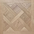 Light stained European white oak wood parquet flooring with a geometric herringbone and diamond pattern, featuring visible wood grain textures.
Engineered European Oak Nouveau Manoir - Parquet is the flooring featured here.