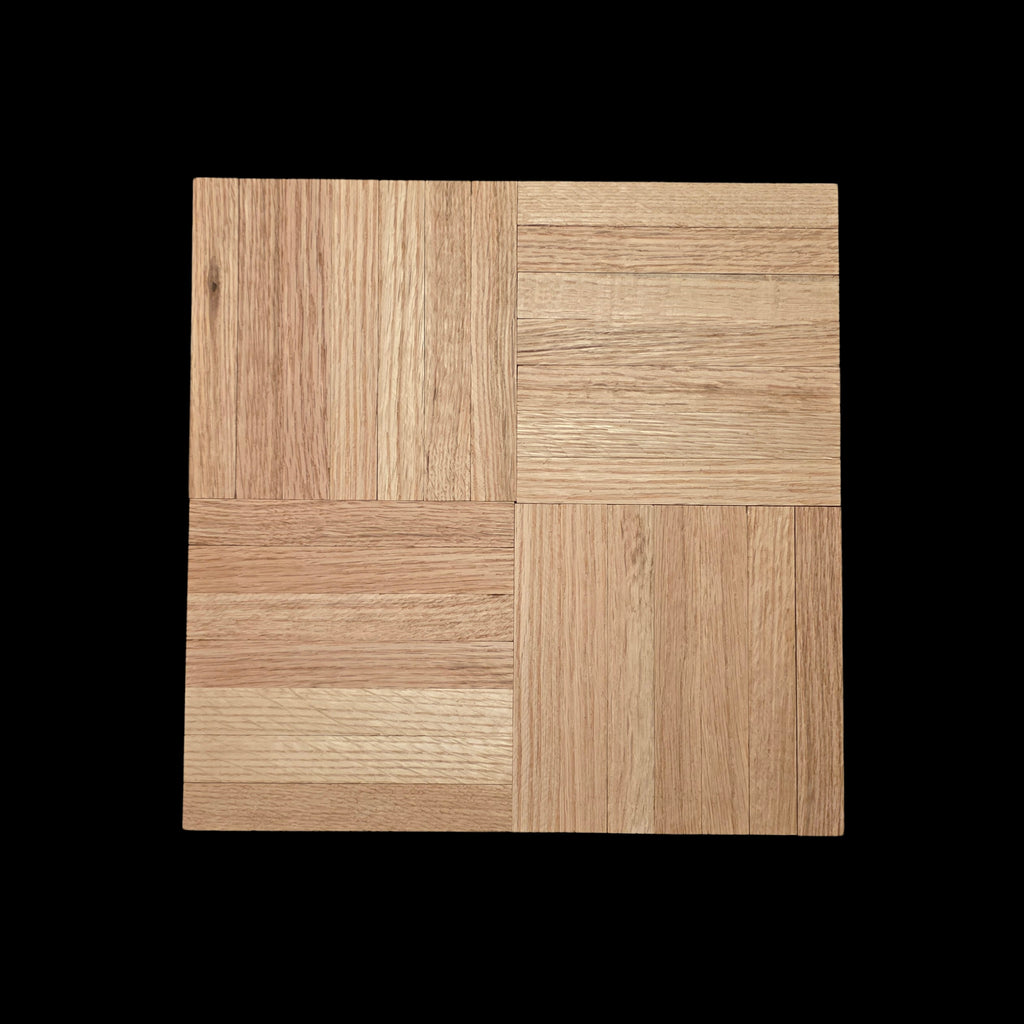 Unfinished Red Oak Parquet - 7 Fingers - 12" x 12" x 5/16" - Single Tile, shown close up with a black fabric background.