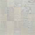 Light gray and off-white wood-look square tiles arranged in a grid pattern, showing varied grain textures. Engineered European Oak Loire Mist Parquet flooring.