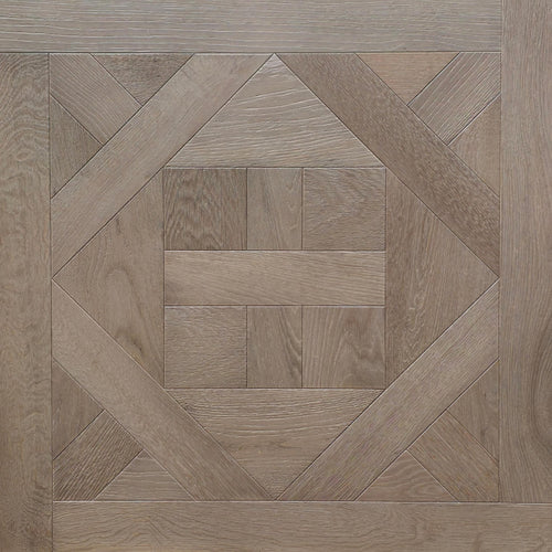 Geometric parquet wood flooring sample with concentric diamond and square patterns in varying light oak tones. Engineered European oak ember valley parquet tile shown. 