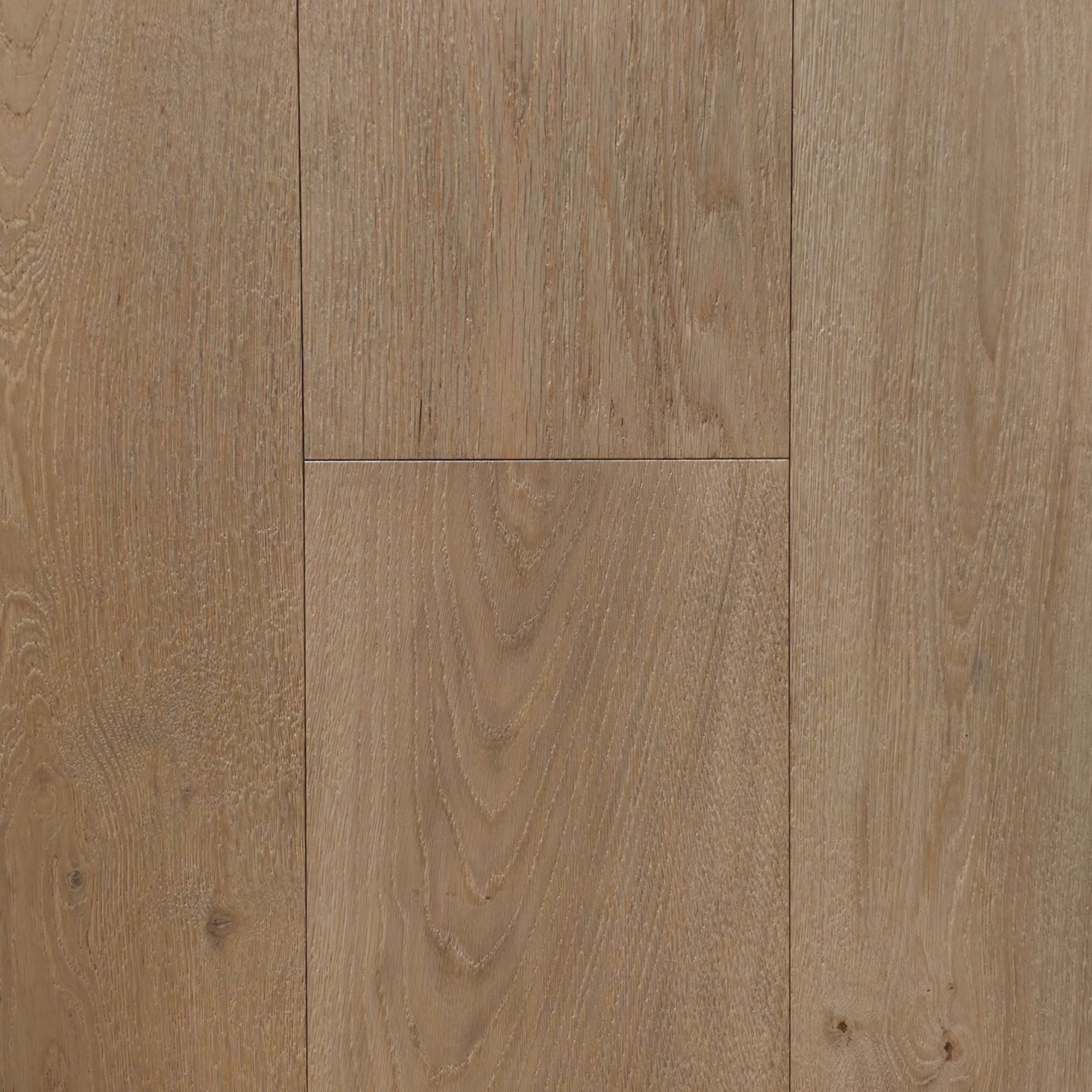 Light oak wood flooring planks with visible natural grain patterns and warm tan-brown tones. Engineered European oak hearthside Oak wide plank is the product shown.